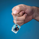 Chaveiro São Carlo Acutis Câmera